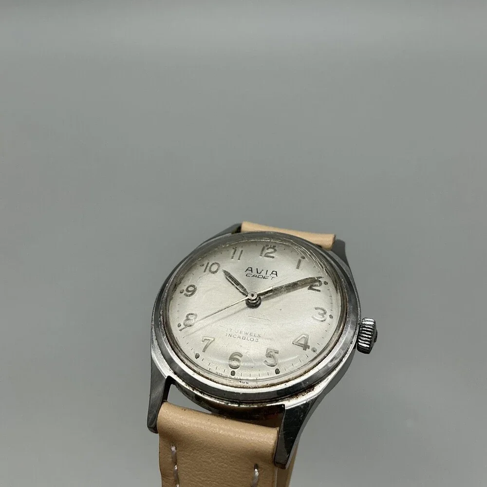 Vintage Avia Cadet Mens Watch 29mm Silver Tone Beige Leather Manual Wind